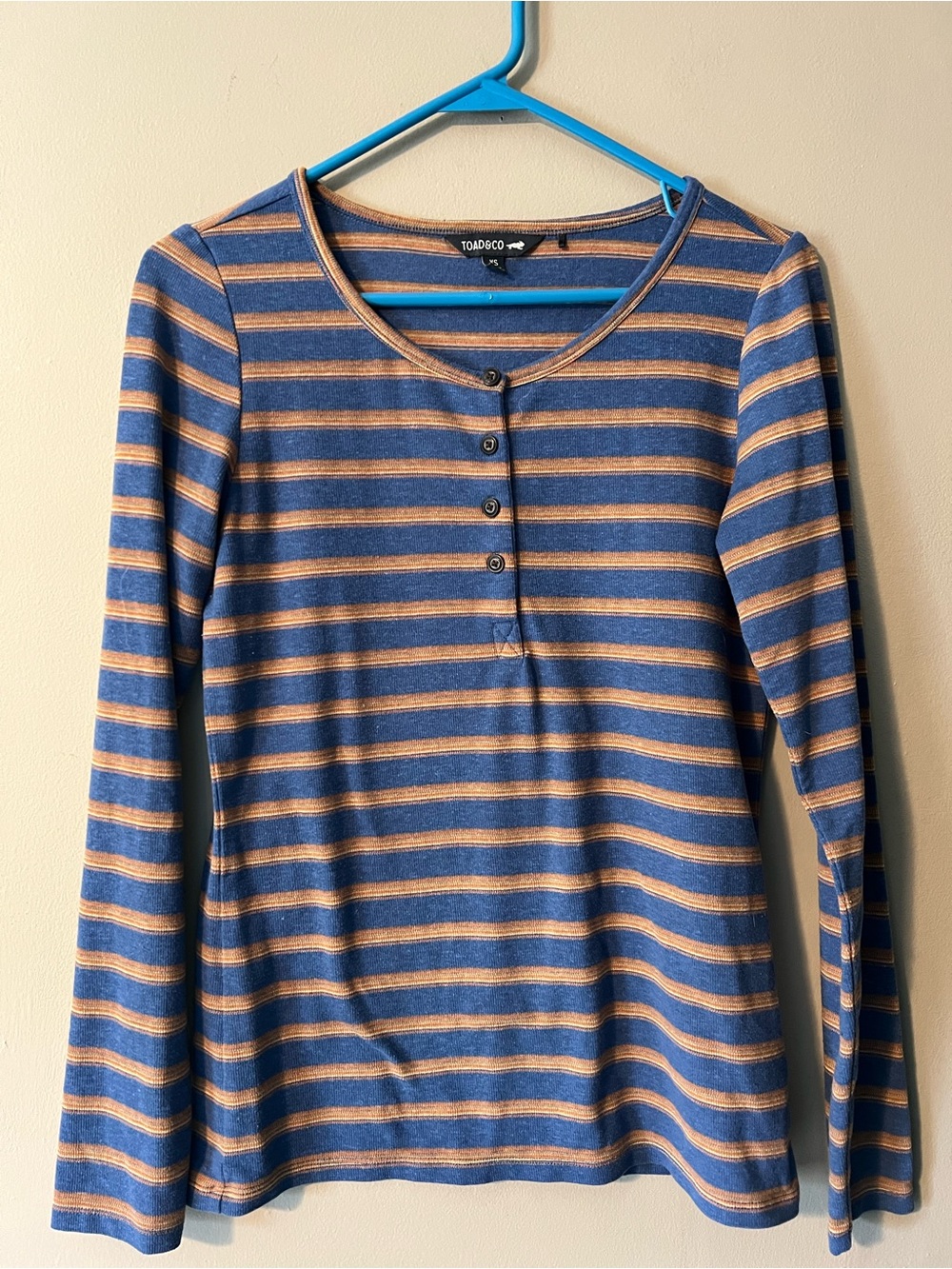 Toad&Co size XS long sleeve blue,orange and white stripe Henley top.